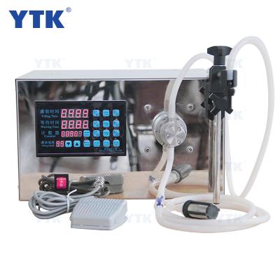 China Semi Automatic Desktop Magnetic Pump Food Corrosive Liquid Filler Filling Machine Price for sale