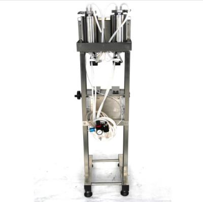 China Penumatic Liquid Filling Machine Food Perfume Filling Machine Vacuum Liquid Filler Two Heads for sale