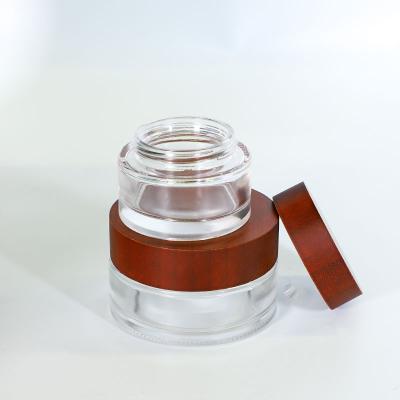 China Stocked Glass Jar 100ml Mini Round Weed Glass Jars High Quality Child Resistant Concentrate From UKETA for sale