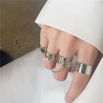 China Cool Fast Delivery Punk Hip Pop Rings Multilayer Adjustable Chain Four Open Finger Rings Ally Man Turn Rings For Women Party Gift for sale