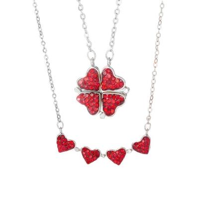 China New fashionable alloy two in one double sided four heart clover necklace Crystal Lucky Grass Collar Fashion Women girl clavicle obstruction for sale