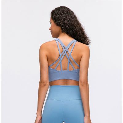 China Breathable Pure Color Shockproof Gathered Hem Sports Underwear Training Yoga Fitness Expanded Bra for sale