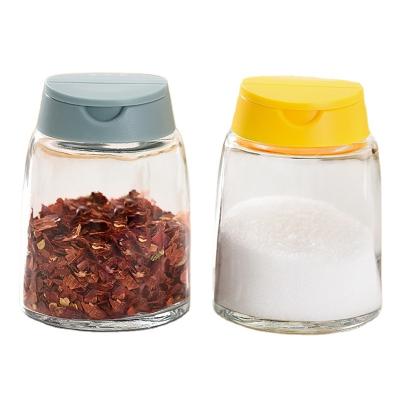 China Sustainable Wholesale Kitchen Household Salt Glutamate Glass Seasoning Bottle With Lid Double Opening Seasoning Jar for sale