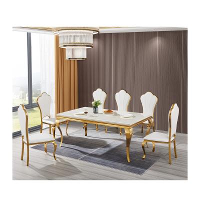 China New Design Convertible Dining Table Modern Style Gold Metal Stainless Steel Legs Marble Dining Table Top Set for sale