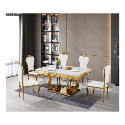 China 8 Seater Convertible Italian Luxury Gold Stainless Marble Top Elegant Furniture Large Dining Table and Chairs Set for sale