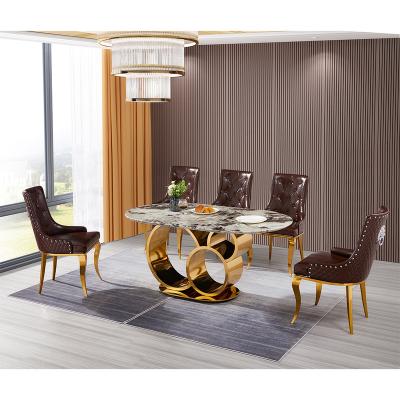 China Convertible luxury marble dining table European style dining low gold dining table and furniture stainless steel chair for sale