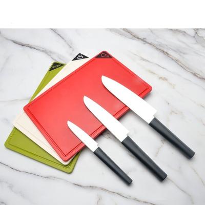 China Sustainable 7 piece kitchen set plastic cutting board and 3 color coded cutting board knives set with 3 knives and matching storage case for sale