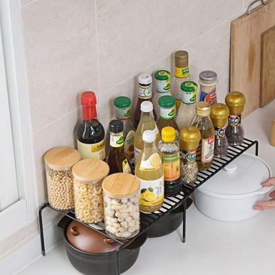 China Minimalist Multifunctional Metal Kitchen Rack Organizer Scalability Stainless Steel Material Storage Shelf for sale