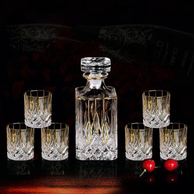 China Luxury Novelty Trace Golden Whiskey Bottle With Lid Crystal Wine Glass Bottle Set for sale