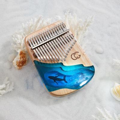 China Newest portable cega resin and maple kalimba sega musical instruments for sale