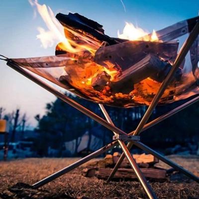 China Amazon hot sale outdoor medium foldable camping pellet wood stocked barbecue grill wood fire smokeless table pit for sale