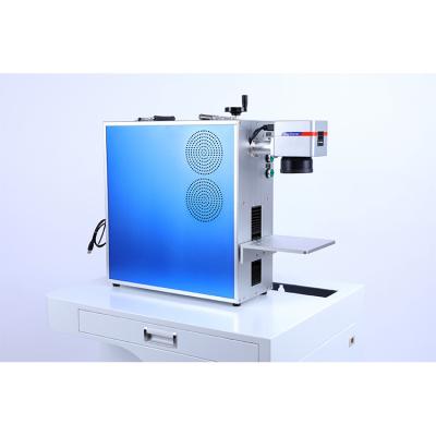 China Small Size Jewelry Engraving Portable Optical Fiber Laser Marking Machine For Metal for sale