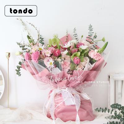 China Transparent Waterproof Tondo Bouquet Wrapping Paper Gift Wrapping Paper For Valentine's Day for sale