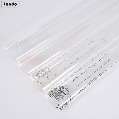 China 2021 Fashion Waterproof Flower Rose Wrapping Paper Korean Transparent Wrapping Film For Valentine's Day for sale