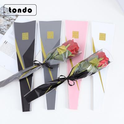 China Tondo Eco-Friendly Wreath Deign Single Plastic Rose Flower Sleeve Transparent Gift BOPP Flower Sleeves for sale