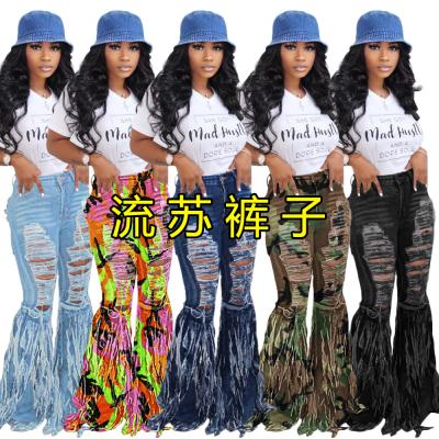 China QUICK DRY fringed brushed denim ripped womens jeans casual flared plus size jeans pants womens trousers and slacks for sale