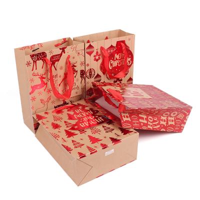 China Recycled Materials Christmas Gift Bags Custom Print New Year Gift Package Recycle Kraft Paper Bags for sale