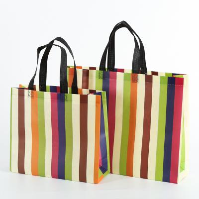 China Hot Sale Cheap Custom Pattern Handled Reuseable Tote Bag Non Woven Bag With Logo for sale