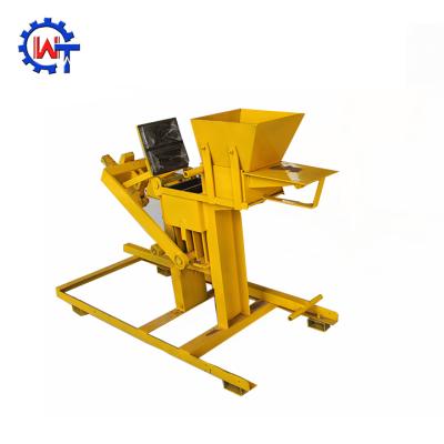 China WT2-40 Interlocking Hotels Clay Pressed Brick Machine Manual Compressed Earth Block Making Machine for sale