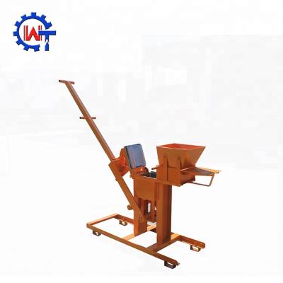 China Building Material Stores WT1-40 Manual Hand Press Clay Block Interlocking Machine for sale