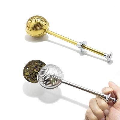 China Stored Hot Sale Gold Tea Ball Stainless Steel Loose Leaf Tea Infuser with Push Handle for sale