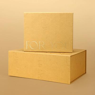 China Rigid Folding Black Paper Packaging Magnet Closure Lid Cardboard Foldable Magnetic Gift Box With Logo for sale