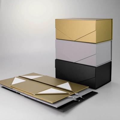 China Folding Cardboard Paper Gift Box Gold Magnetic Packaging Box for sale