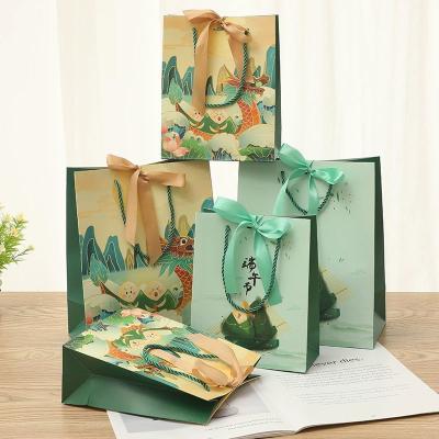 Cina Borsa regalo per feste di compleanno carta Kraft per lo shopping caramelle personalizzata con logo in vendita