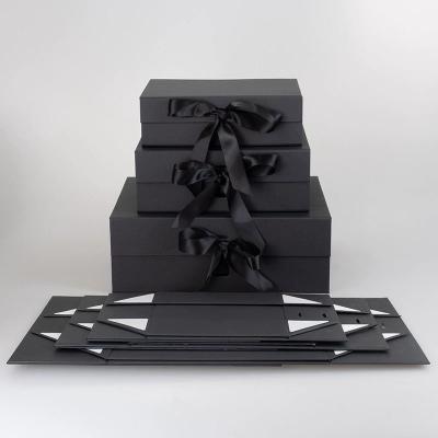 Chine Livre noir en forme de papier cadeau en carton rigide boîte pliable papier imprimé sur mesure boîte cadeau magnétique à vendre