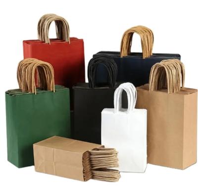 China Bolsa de papel Kraft biodegradable y personalizable con mango Bolsa de regalo Bolsa de papel de compras ecológica en venta