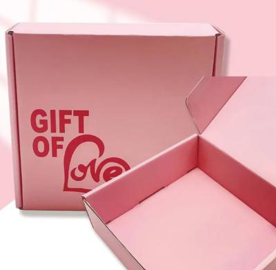 China Color rosa envasado cosmético corrugado caja de correo caja de envío de papel logotipo personalizado en venta