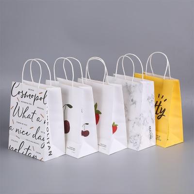 China Reusable  flat bottom paper bags christmas paper gift bags paper twist handle bags for sale