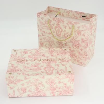 China Embalaje cosmético rosa personalizado cajas de regalo plegables de cartón Cajas plegables de imán con embalaje impreso bolsas de regalo en venta