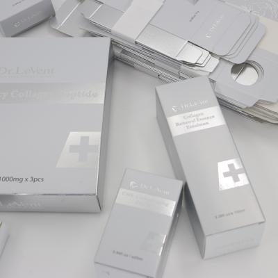 China High-Grade Silber Hautpflege Verpackungskiste Kosmetische ätherische Ölmaske Verpackungskiste Druck Logo zu verkaufen