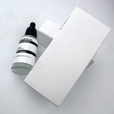 China Custom Logo Branded Cosmetic Paper Packaging Box For Essential Oils Candle Perfume And Skincare Products Hot Stamping Silver Stamping Embossing for sale