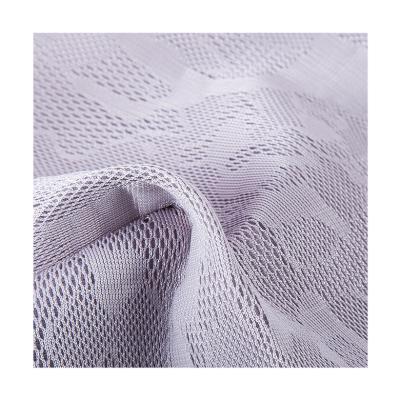 China Waterproof Best Selling Breathable Polyester Warp Knit Jacquard Fabric Surat Textile Jacquard Air Mesh Fabric for sale