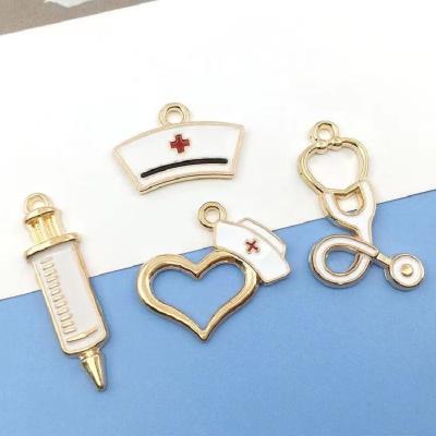 China Hot Punk Personalized Alloy Enamel Pendants Stethoscope Charm Nurse Hat Syringe Charm For DIY Jewelry Making Key Chain Accessories for sale