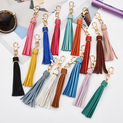 China New promotion gift 26 different color style PU tassel DIY main chain tassel bag key chain common leather accessories for sale