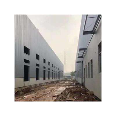 China Modern Structural Metal Steel Frame Prefab Temporary Workshop Steel Structure Workshop Commercial Construction Buildings à venda