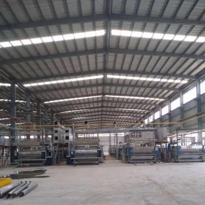 China Industrial low cost lightweight steel structure frame prefab workshop prefab large span steel structure building à venda