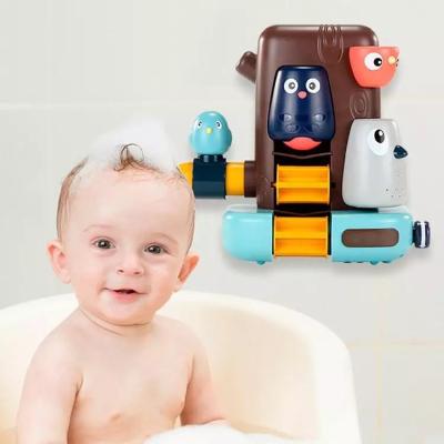 China Eco-Friendly Material Summer Fun Playing Safe Baby Woodpecker Water Spray Toy Children's Bath STEM Bathroom Treehouse Shower Animals Tub With Cup for sale