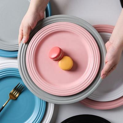 China Viable Customized Nordic Ceramic Round Flat Plates Sushi Dishes Pure Color Dessert Dishes Ceramic Dishes for sale