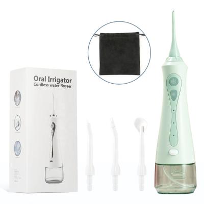 China Car Water Flosser For Teeth C9 Green Water Flosser With Toothbrush IPX7 Oral Irring Water Flosser for sale