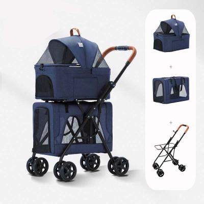 China Small Animals Newleader Chariot Pour Pets Portable Folding Detachable Double Pet Stroller For Outdoors. for sale