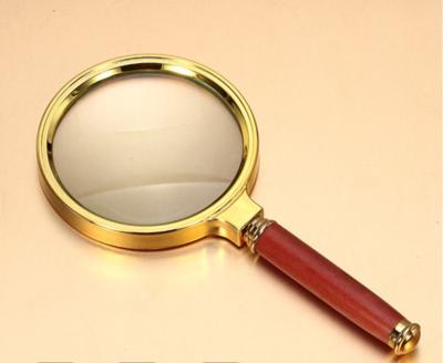 China Zoom In Portable Handheld Magnifying Glass For Newspaper Book Reading Hand 10x Magnifier Lens Price Wooden Hand Magnifier for sale