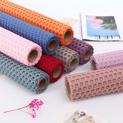 China Imported floral wrapping material thread thickened anti-curvature wrapping material gauze bouquet wrapping gauze wrapping paper for sale