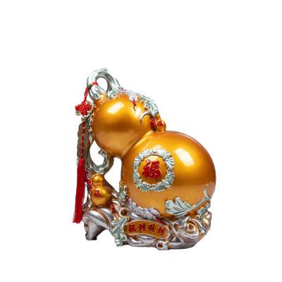 China New Resin Feng Shui Modern Chinese High-grade Hand-painted Gold Material Squash Piggy Bank Creative Household Living Room Decorations for sale