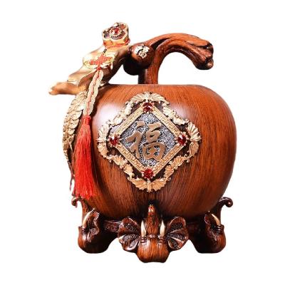 China China Texture Gold Wood Grain Resin Ornaments Luxury Hand Painted Apple Shaped Piggy Bank Home Decoration Gifts Great for sale