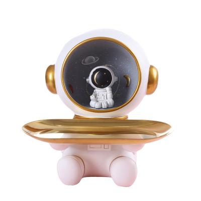 China 2022 New Decorative Astronaut Money Box Pendant Tray With Lamp Piggy Bank Porch Bedroom Desktop Ornament Resin Decoration for sale