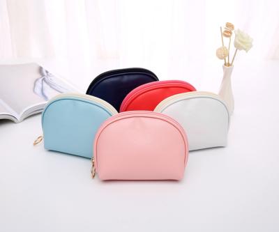 China Waterproof 2021 New Arrival Korean Cute Shell Professional Style Small PU Waterproof Pink Cosmetic Bag for sale